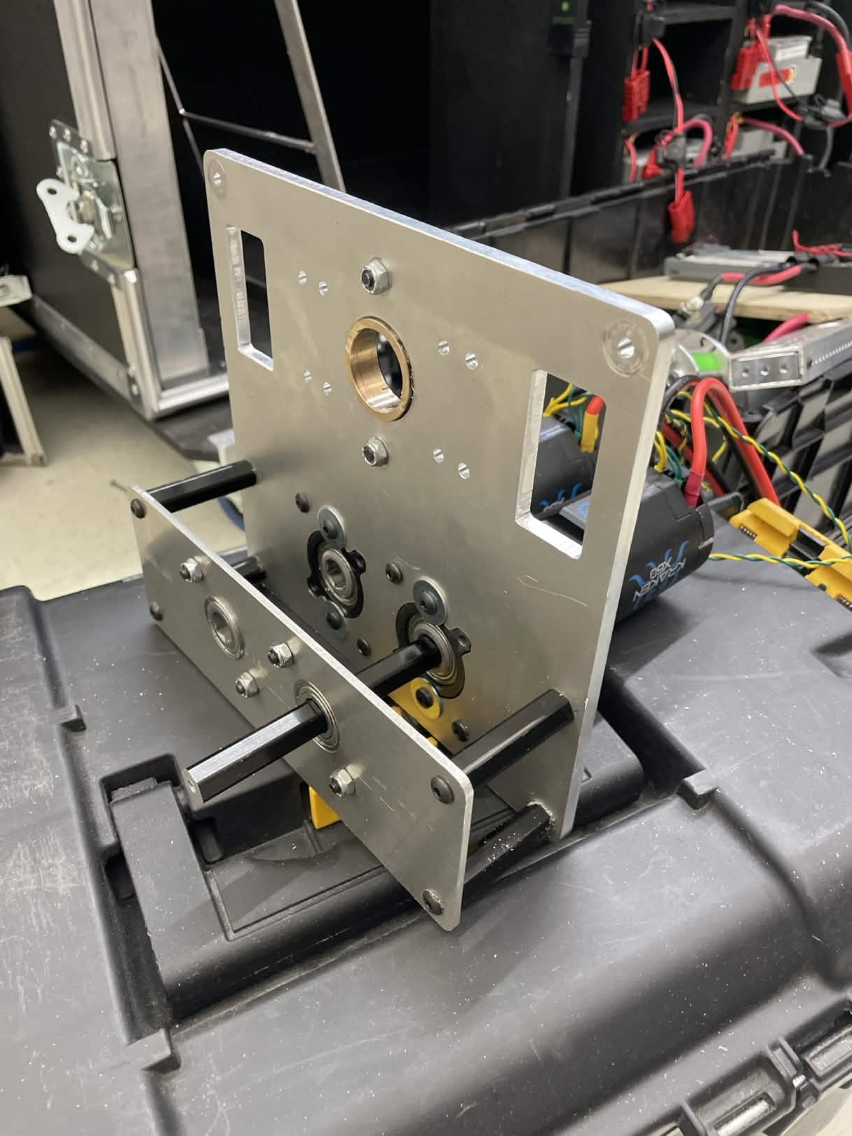 Custom jig to hold steel sprocket on router worksurface